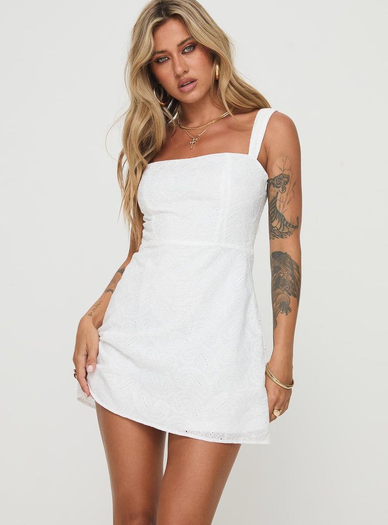 Broderie anglaise mini dress Adjustable shoulder straps, square neckline, invisible zip fastening down side Non-stretch material, fully lined 