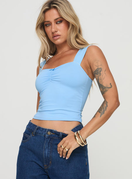 Crop top Cap sleeve, square neckline, pinched bust Good stretch, unlined 