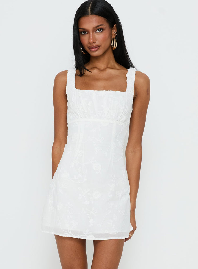 dearly embroidered mini dress white Donnamarie The Secret Isle Embroidered Mini Dress is a dreamy escape with its tie White Embroidered Strapless Tulle Mini