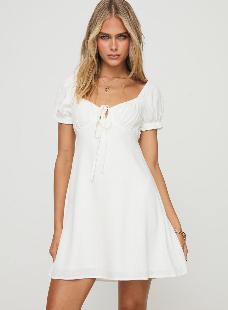 White mini dress Elasticated puff sleeves, tie fastening at bust