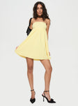 Lemon Strapless mini dress Inner silicone strip at bust, shirred band at back, invisible zip fastening at side