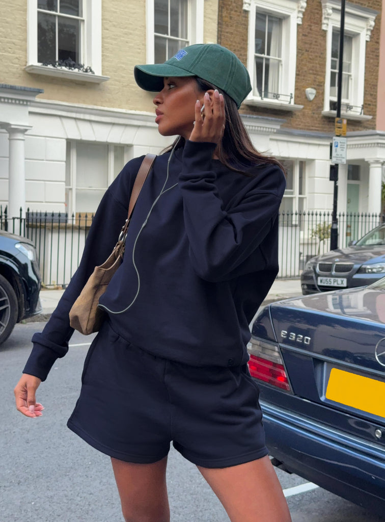 The Everyday Naomi – Striped Ribbed Crew-Neck Sweatshirt main image 0