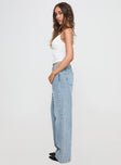 side view of model wearing Princess Polly Anelli Low Rise Straight Leg Jeans Light Blue Wash High Waisted