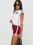 Shorts Elasticated waistband, contrast lining detail, split hem at sides Good stretch, unlined