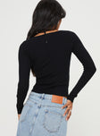 Long sleeve top Ribbed knit material, sweetheart neckline  Good Stretch, unlined 