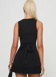 Vest top High neckline, button fastening, twin hip pockets, tie detail at back Non-stretch material, fully lined 