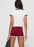 Shorts Elasticated waistband, contrast lining detail, split hem at sides Good stretch, unlined