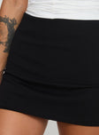 Low rise mini skort Invisible zip fastening at side, raw edge hem Good stretch, unlined 