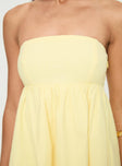 Lemon Strapless mini dress Inner silicone strip at bust, shirred band at back, invisible zip fastening at side
