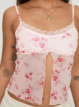 Floral print top Adjustable shoulder straps, scooped neckline, split hem Good stretch, lined bust