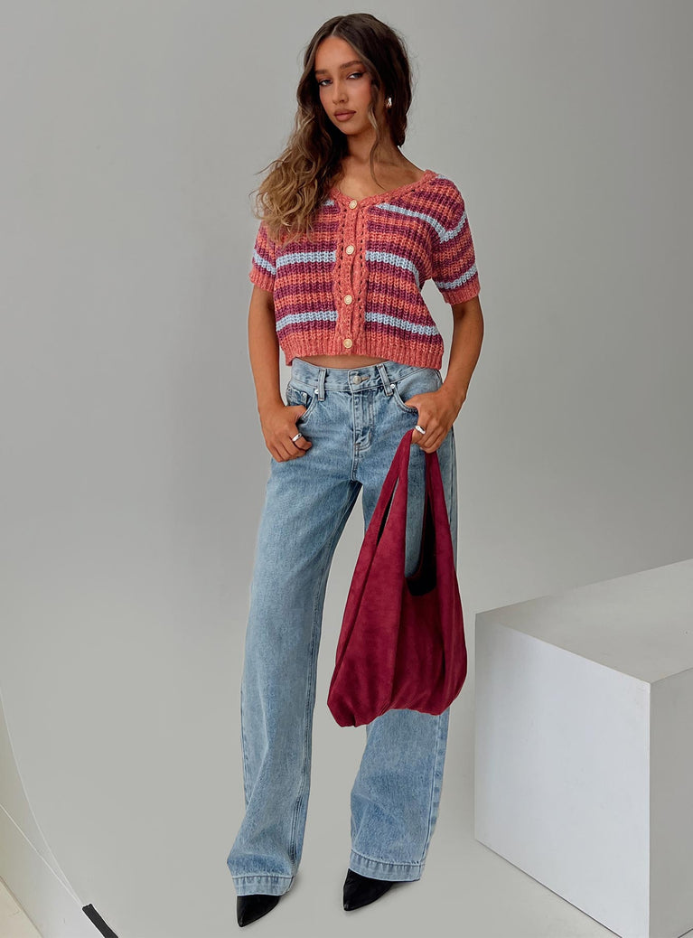 side view of model wearing Princess Polly Anelli Low Rise Straight Leg Jeans Light Blue Wash High Waisted