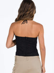 Black strapless top Cotton Embroidered detail material Invisible zip fastening at back Non stretch Lined bust