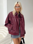 Burgundy bomber jacket Faux leather material  Classic collar  Zip front fastening  Ribbed waistband and cuffs  Twin hip pockets