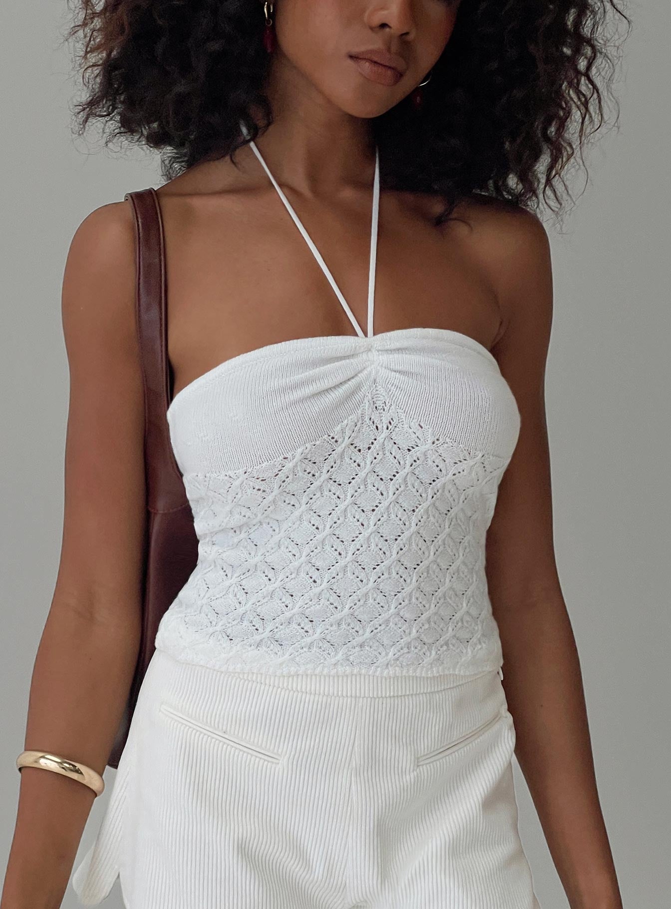 front view of model wearing Princess Polly Kaptan Top White Sleeveless Sweetheart 