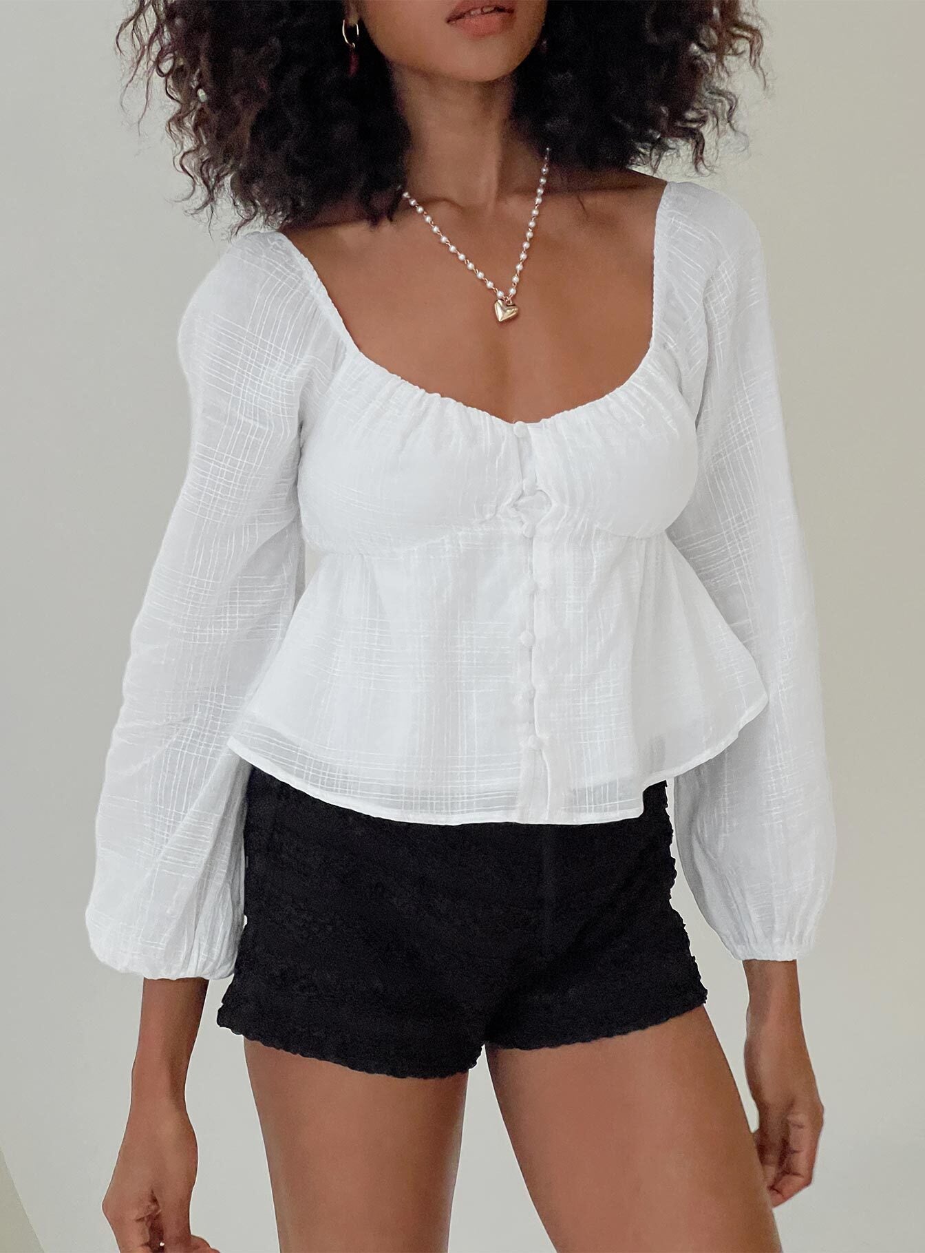white flowy long sleeve crop top