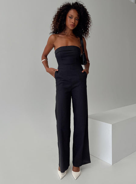Strapless jumpsuit Inner silicone strip at bust, invisible zip fastening, fold at bust, straight leg fit Non-stretch material, unlined 