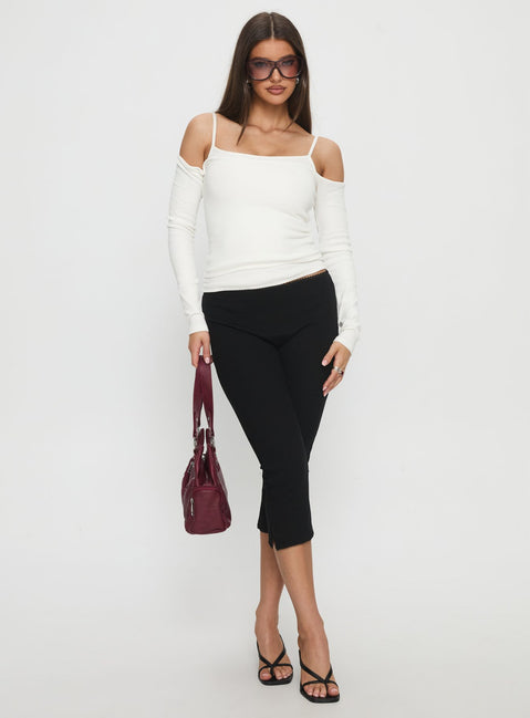 front view of model wearing Princess Polly Baseline Rib Capri Pants Black Petite Mid Rise Pants 