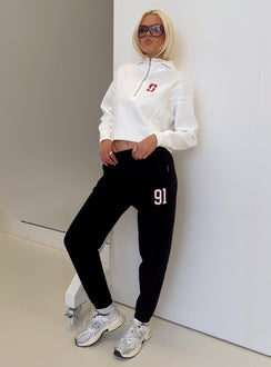 front view of model wearing Princess Polly Stanford Basic Sweatpants Black High Rise Pants 