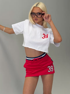  front view of model wearing Princess Polly Boston University Basketball Skirt Red Mini Skirts 