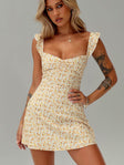 side view of model wearing Princess Polly Landon Mini Dress Yellow Floral Sweetheart Neckline 