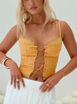 front view of model wearing Princess Polly Amitri Lace Up Top Orange Sleeveless Plunger 