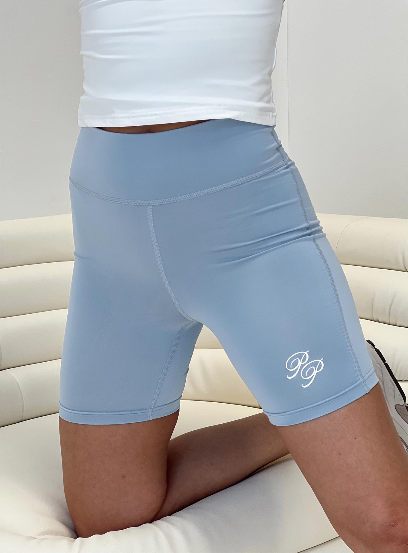 Princess Polly Bike Shorts Cursive Text Pale Blue/ Eggshell Princess Polly mid-rise 