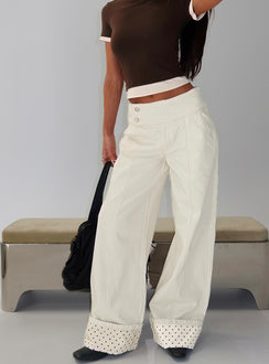 back view of model wearing Princess Polly Nikoletta Foldover Jeans Cream / Polka Mid Rise Jeans 