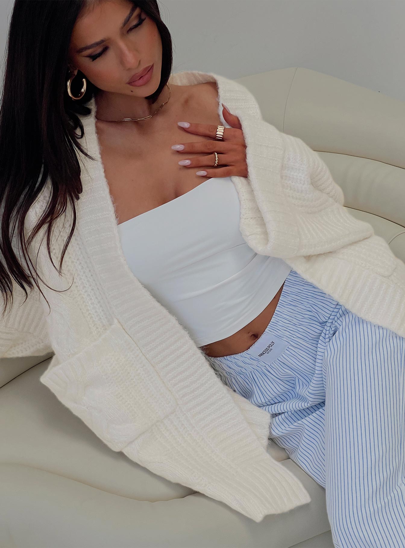 side view of model wearing Princess Polly Paisleigh Cable Knit Cardigan Cream Long 