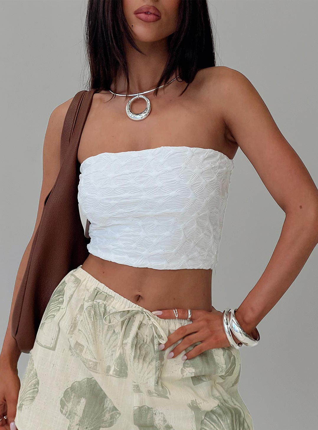 front view of model wearing Princess Polly Fidget Strapless Top White Sleeveless straight 