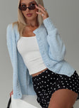 side view of model wearing Princess Polly Coronado Boucle Knit Cardigan Blue Long 