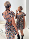 Floral mini dress Square neckline, padded bust, open back with tie fastening