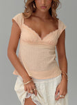 front view of model wearing Princess Polly Lunya Cap Sleeve Top Beige Short Sleeves Plunger 