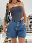 back view of model wearing Princess Polly Lou Carpenter Denim Shorts Mid Wash Lower Impact High Waisted Shorts 