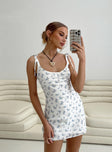 Floral print mini dress, slim fitting Adjustable shoulder straps, scooped neckline, invisible zip fastening at side