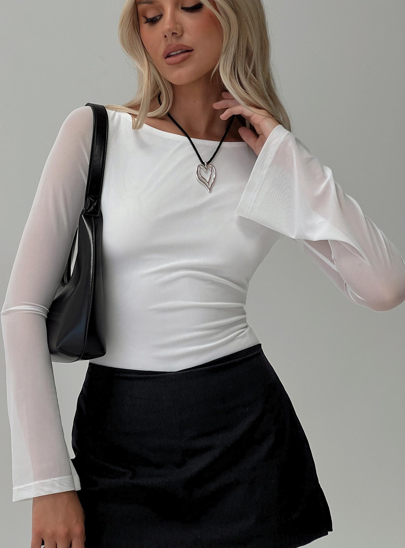 front view of model wearing Princess Polly Lukea Long Sleeve Bodysuit White Full Sleeves 