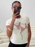 front view of model wearing Princess Polly By The Seaside Graphic Top Cream Short Sleeves Crew Neck 