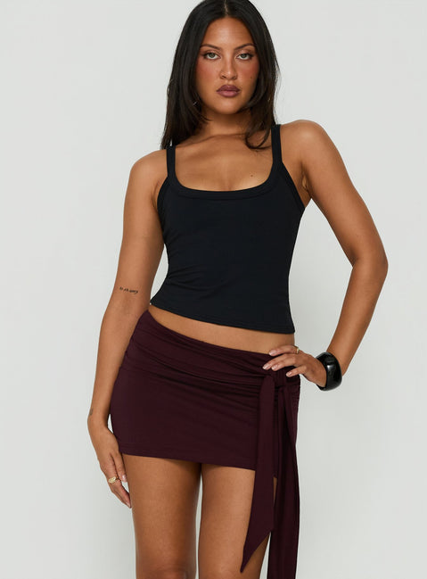 Introducing the Eldric Tie Waist Micro Skirt Aubergine womens-skirts in mini length front view of model wearing