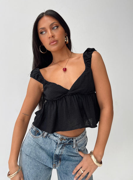 Crop top V-neckline, cap sleeve, frill hem Slight stretch, partially lined