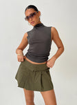 Low rise mini skirt Folded waist, zip and clasp fastening, twin hip pockets, pleated design