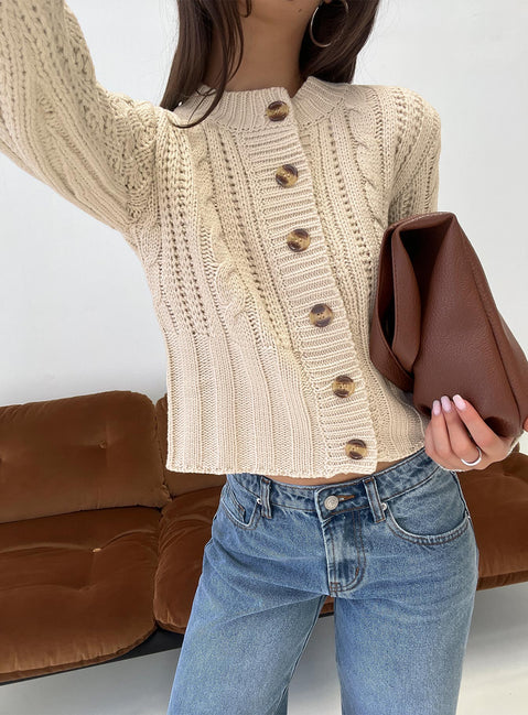front view of model wearing Princess Polly Donielle Cable Knit Cardigan Beige cropped 