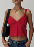 front view of model wearing Princess Polly Prevost Cami Top Red Sleeveless V-Neck 