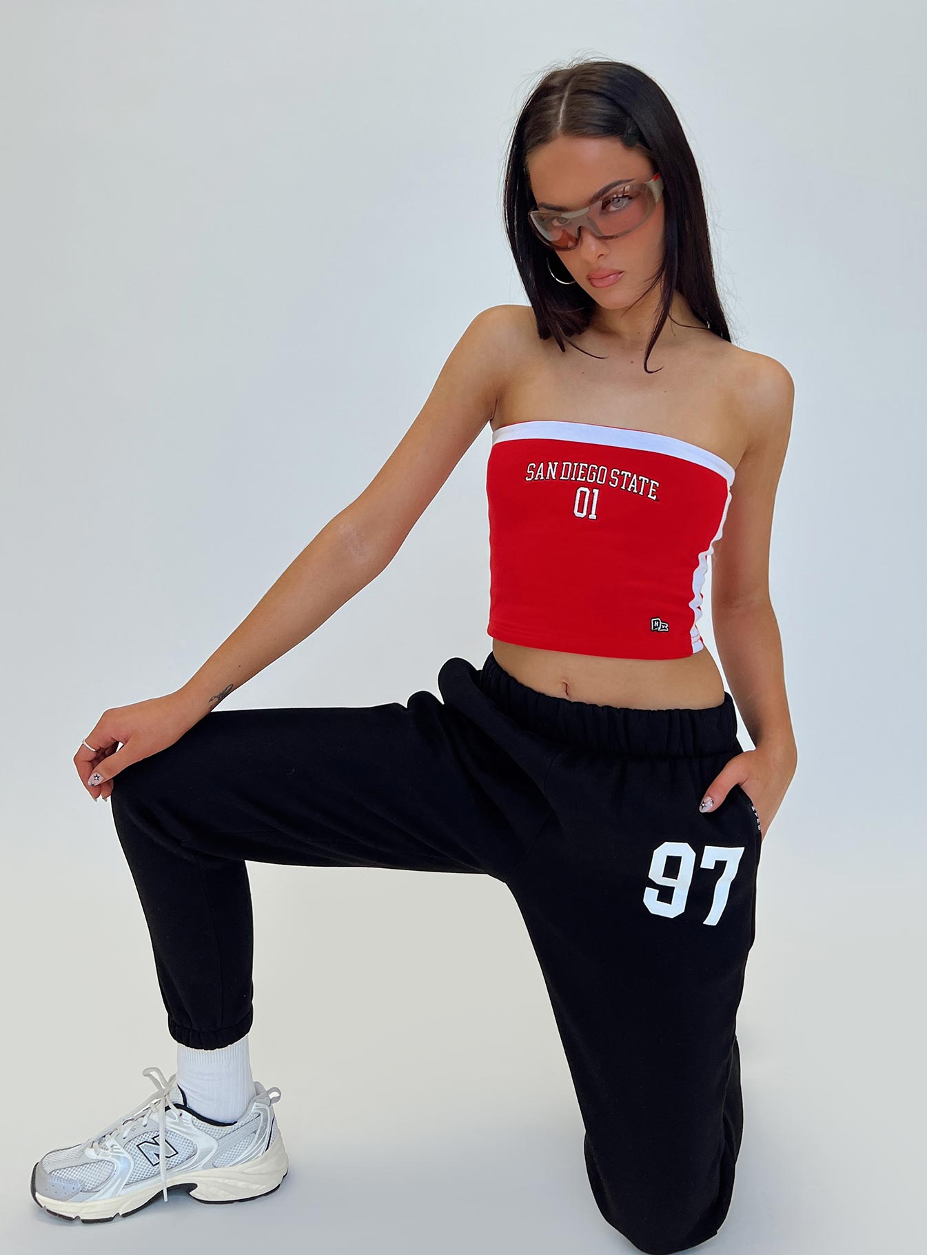 front view of model wearing Princess Polly SDSU Sweatpants Black 