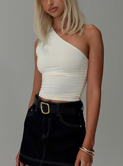 side view of model wearing Princess Polly Annem One Shoulder Top Cream Sleeveless Asymmetric Neckline 