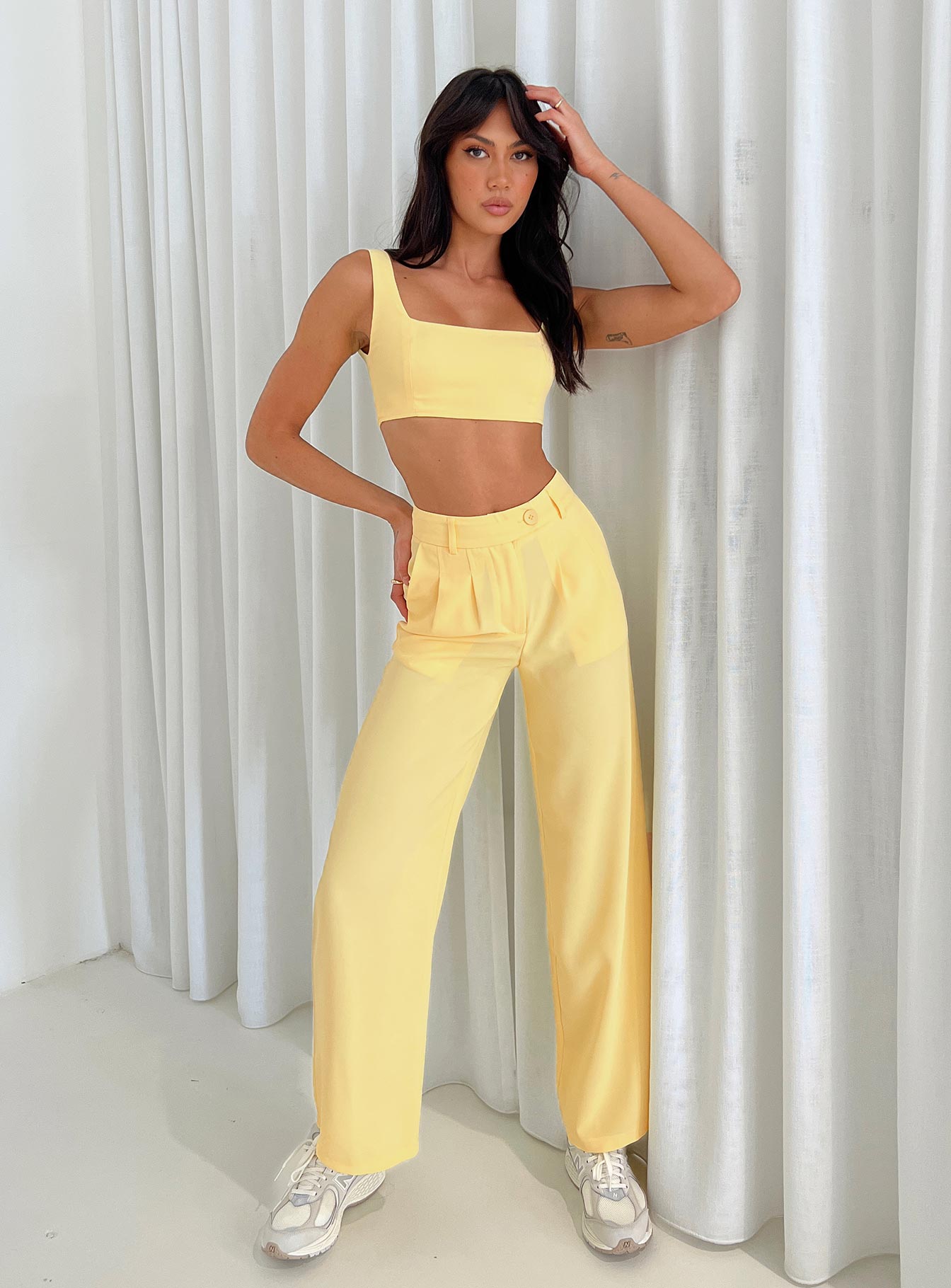 Matching set Crop top Invisible zip fastening at side High waisted pants Wide leg Belt looped waist Zip and button fastening