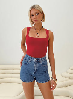 Mid-wash denim shorts High rise, belt looped waist, zip and button fastening, five pockets,  branded patch at back Non-stretch material, unlined 