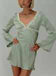 Silky long sleeve mini dress V neckline, lace trim, tie fastening at back, invisible zip fastening at side
