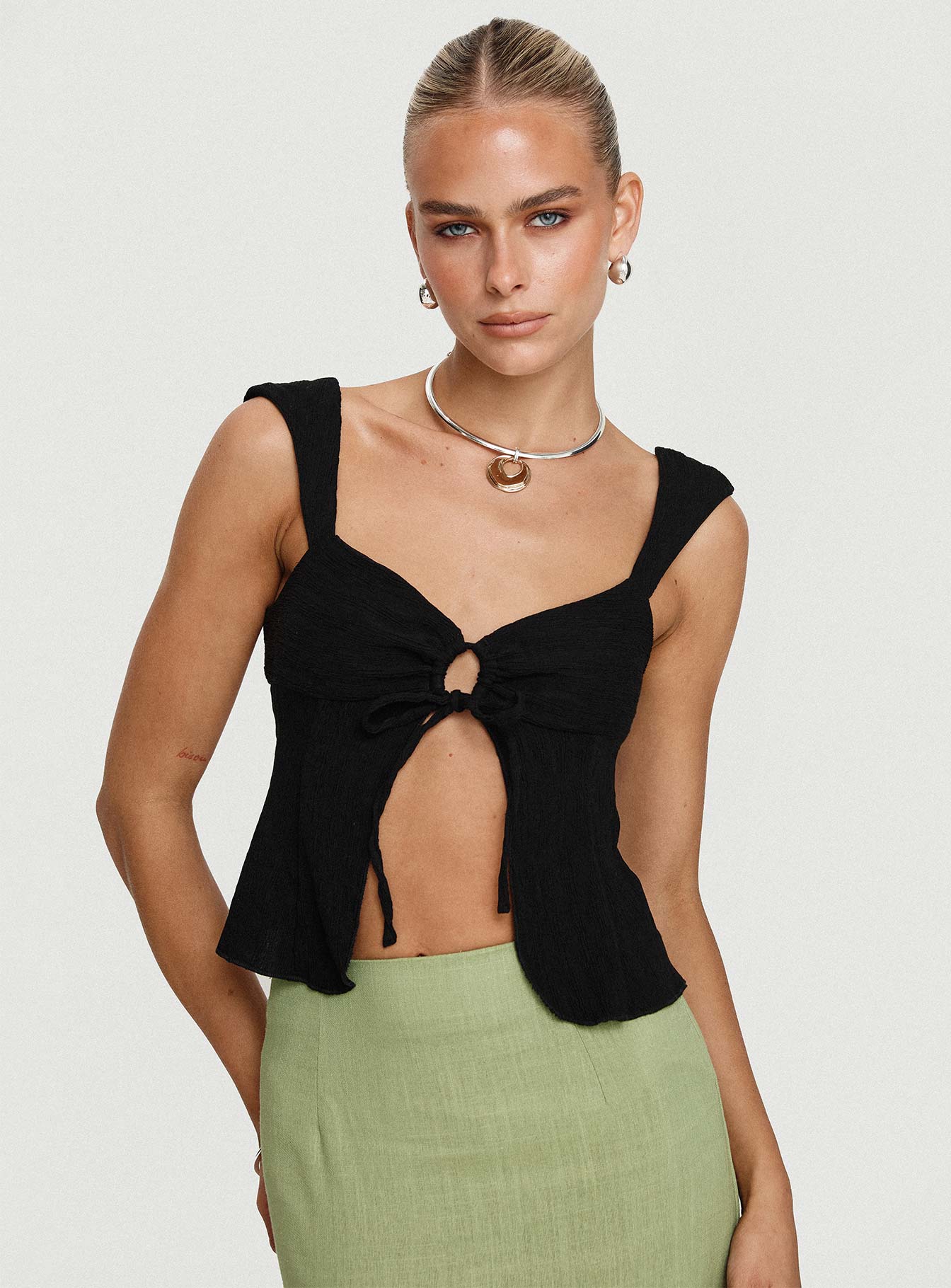 front view of model wearing Princess Polly Moshe Top Black Sleeveless Sweetheart 