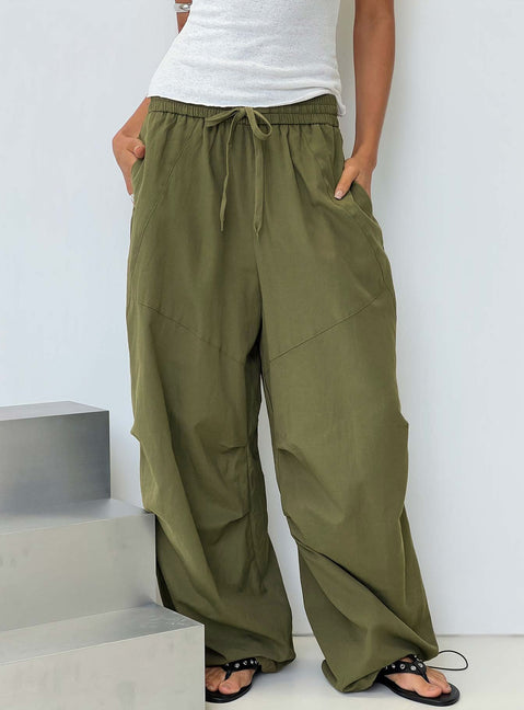 Discover the Mankind Baggy Cargo Pants Olive in womens-regular-pants with mid-rise waist front view of model wearing Princess Polly