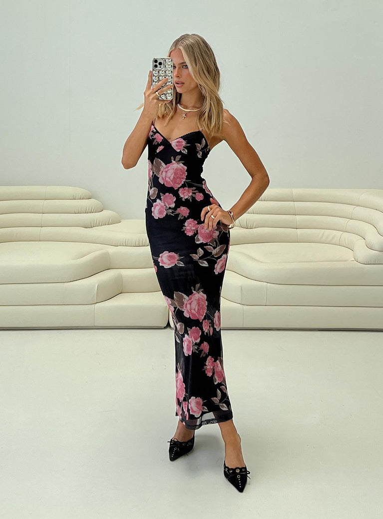 side view of model wearing Princess Polly Manolis Maxi Dress Black / Floral V-Neck 