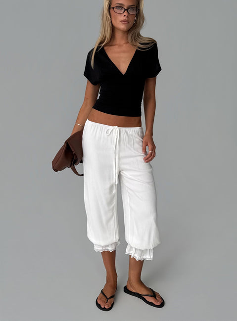 front view of model wearing Princess Polly Basma Bloomer Trouser Pants Rayon White Mid Rise Pants 